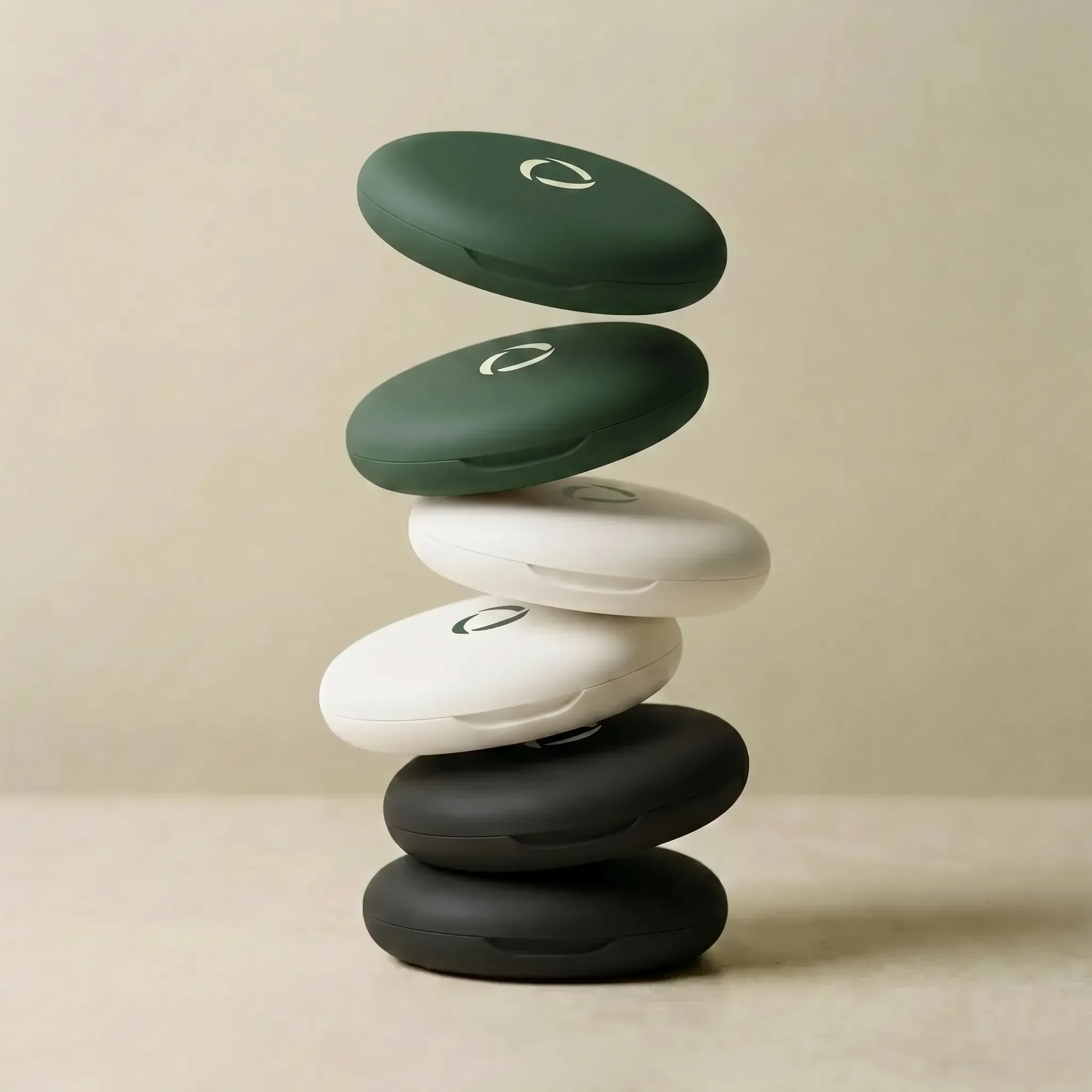 Velare cases stacked in green, porcelain and black